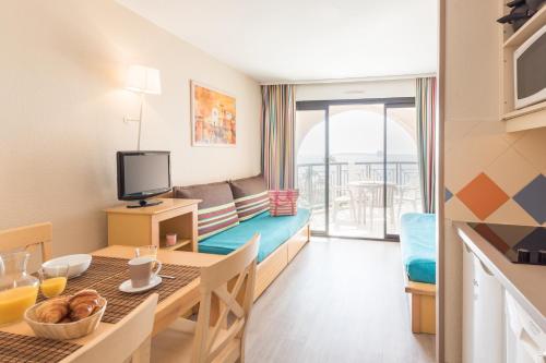 Televisyen dan/atau pusat hiburan di Résidence Pierre & Vacances Cannes Verrerie