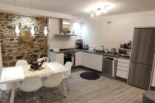 Kjøkken eller kjøkkenkrok på Precioso Apartamento 1 Hab con Bañera Hidromasaje