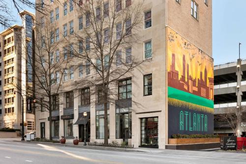 a building on the corner of a street at Glenn Hotel, Autograph Collection in Atlanta