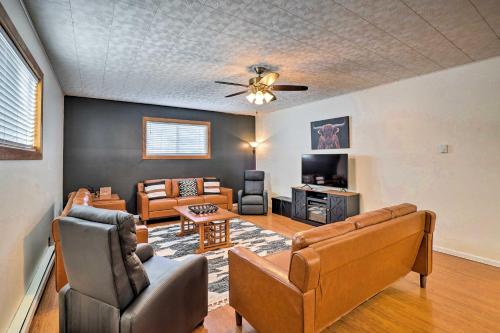 a living room with a couch and chairs and a tv at Ranch Suite Condo Less Than 1 Mi to National Park in Medora