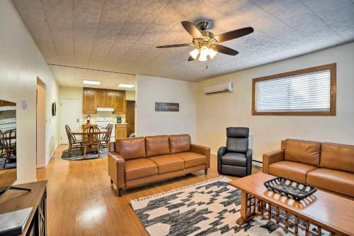 a living room with leather furniture and a ceiling fan at Ranch Suite Condo Less Than 1 Mi to National Park in Medora