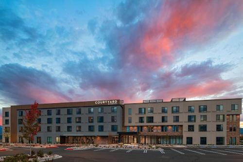 a rendering of a hotel with a cloudy sky at Courtyard by Marriott Colorado Springs North, Air Force Academy in Colorado Springs