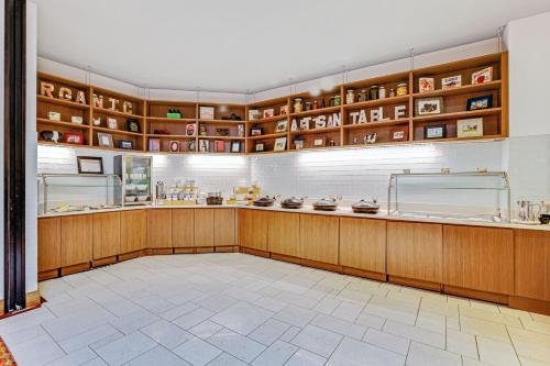 a large room with wooden cabinets and shelves at Chicago Marriott Naperville in Naperville
