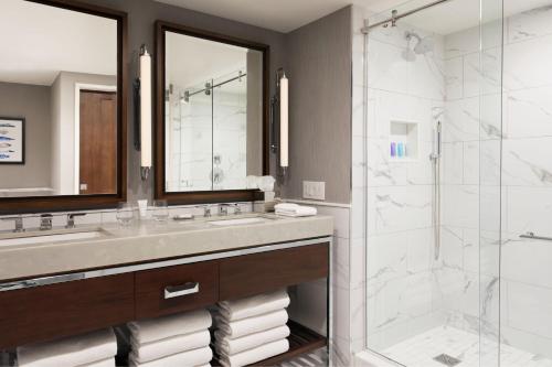a bathroom with a sink and a shower at Boston Marriott Long Wharf in Boston