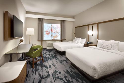 Кровать или кровати в номере Fairfield Inn & Suites by Marriott Fort Smith