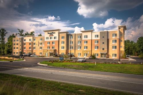 a large building on the side of a road at TownePlace Suites by Marriott Goldsboro in Goldsboro