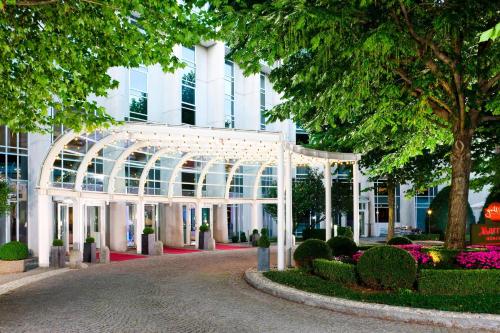 a greenhouse in front of a building at Munich Marriott Hotel in Munich