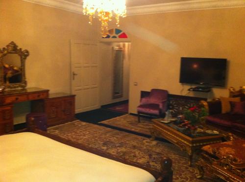 Una cama o camas en una habitación de Villa Des Ambassadors