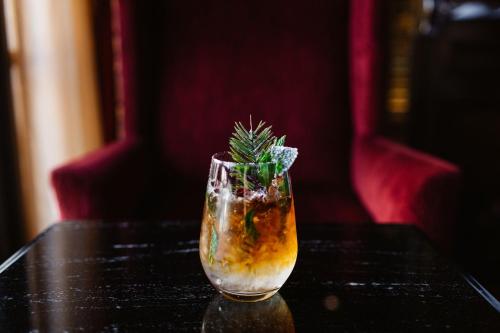 a drink in a glass on a table at The St. Regis Washington, D.C. in Washington