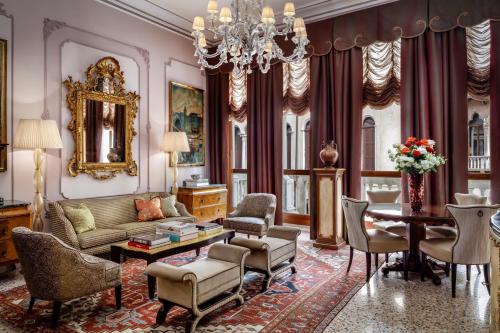 a living room with a couch and a table at The Gritti Palace, a Luxury Collection Hotel, Venice in Venice
