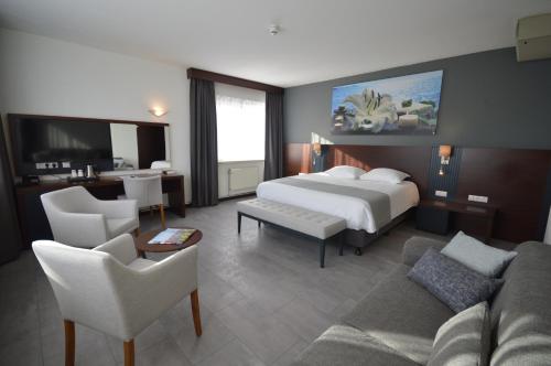 Katil atau katil-katil dalam bilik di Atlas Hotel Holiday