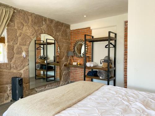 Postel nebo postele na pokoji v ubytování Dos Aguas Hotel Boutique