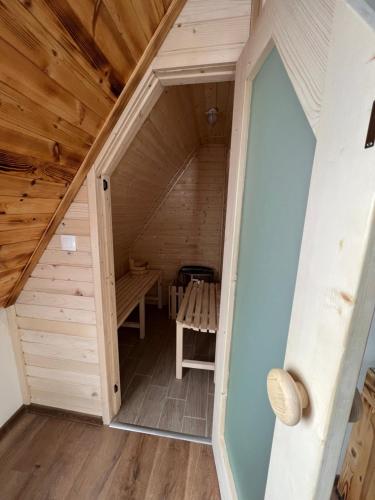 a small attic room in a wooden house at Nicole Hotel & Restaurant in Samokov