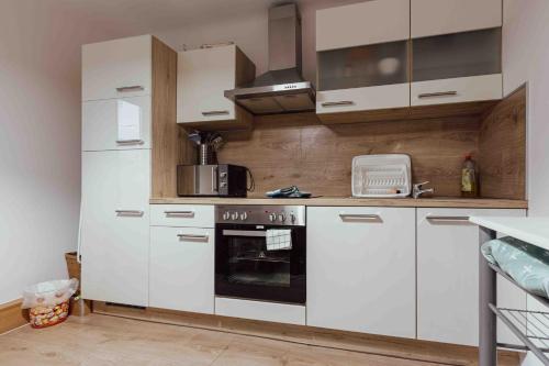 Una cocina o cocineta en Benjamins Refugium