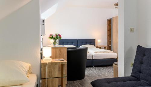 Postel nebo postele na pokoji v ubytování Hotel Krone