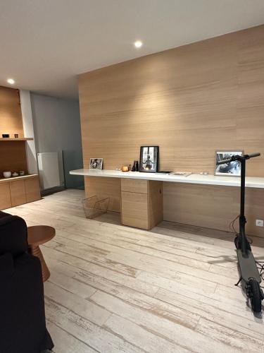 an office with a reception desk with a wooden floor at Luxurious and cosy loft - Knokke in Knokke-Heist
