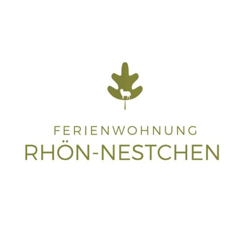 a logo for a women working iron kitchen at Rhön - Nestchen in Unteralba