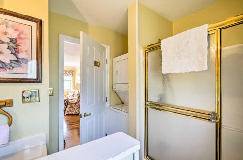a bathroom with a shower and a refrigerator in it at Damascus Apt with Views, Walk to Shops and Parks! in Damascus