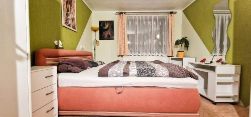 Postel nebo postele na pokoji v ubytování Třebeč House