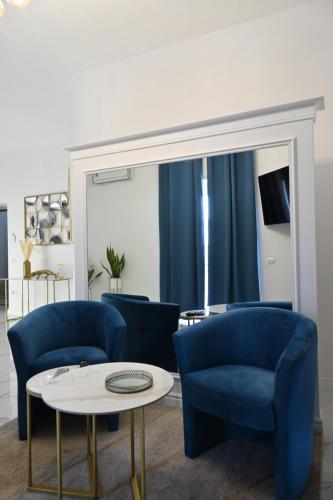 Posedenie v ubytovaní NM Luxury Suites