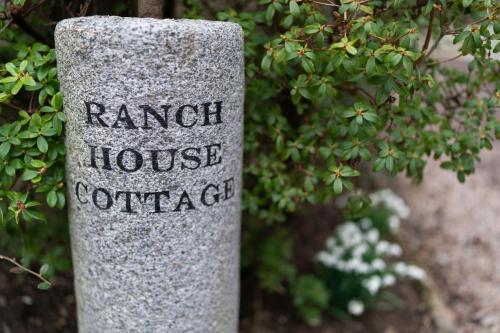 a stone post with the words ranch house confederacy at Ranch House Cottage Inverurie 