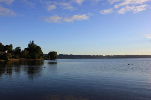 a view of a large body of water at Lakeview Small Studio in Rotorua