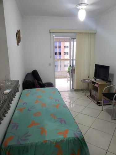 Ένα ή περισσότερα κρεβάτια σε δωμάτιο στο Pé na Areia