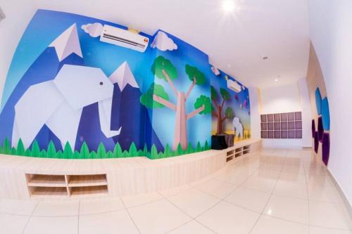 a hallway with a mural of a bear and mountains at The Icon 3 Condo in IOI City Mall Putrajaya, Pool View in Putrajaya