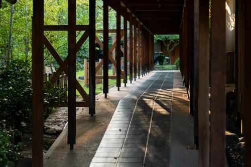 a hallway of a building with a walkway at Tokiwa Hotel in Kofu