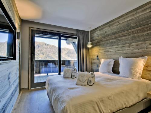 Appartement skis aux pieds, cheminée, conciergerie 5* - FR-1-613-37