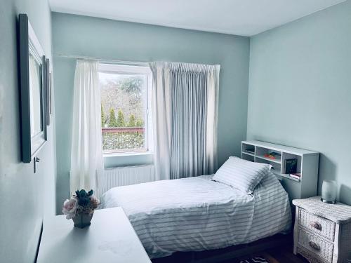 Un pat sau paturi într-o cameră la MountForest