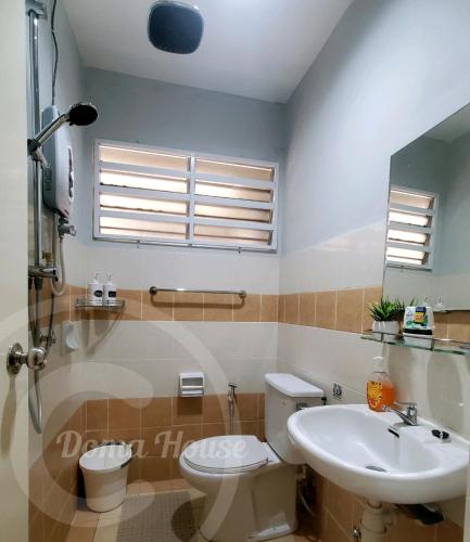 a bathroom with a toilet and a sink at Doma House Alpine at Lost World of Tambun in Tambun