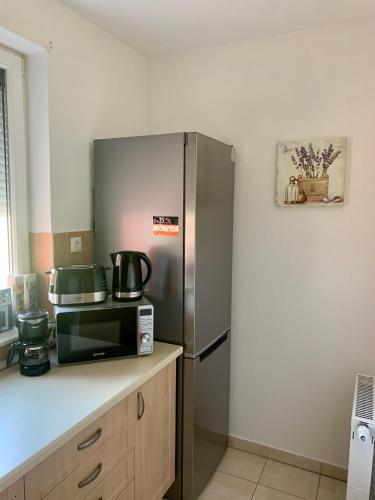 Η κουζίνα ή μικρή κουζίνα στο Chance Apartman Bükfürdő