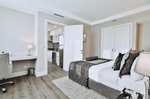 Ένα ή περισσότερα κρεβάτια σε δωμάτιο στο New Park Hotel