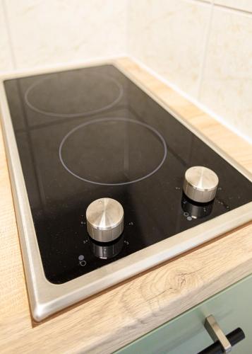 a stove top oven sitting on top of a counter at Weisses Rössl in Pfreimd