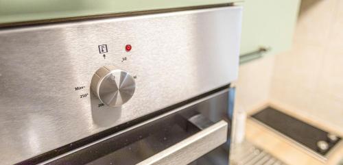 a close up of a microwave oven in a kitchen at Weisses Rössl in Pfreimd