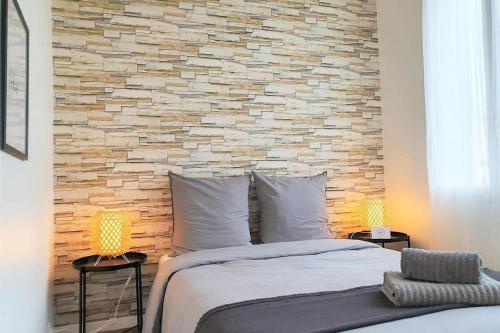 En eller flere senge i et værelse på L'Atelier d'Artiste, Proche gare SNCF - 3 chambres