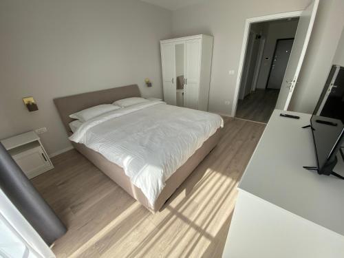 Postel nebo postele na pokoji v ubytování Mangalia Residence 1