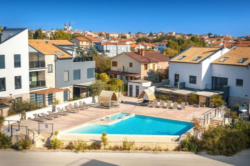 an image of a swimming pool in a villa at Vizula Sunset F - Noa & Aurelia Maris in Medulin