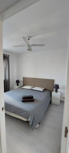 Postel nebo postele na pokoji v ubytování Sand Club Family