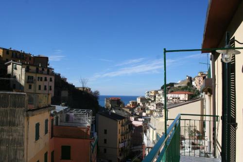 a view of the city from a balcony at Affittacamere Dai Baracca in Riomaggiore