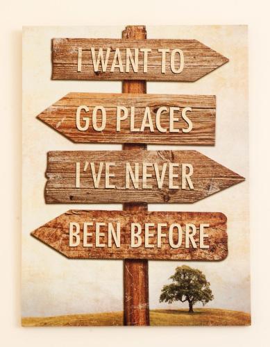 a sign that says i want to go places ive never been before at Callander Hostel in Callander