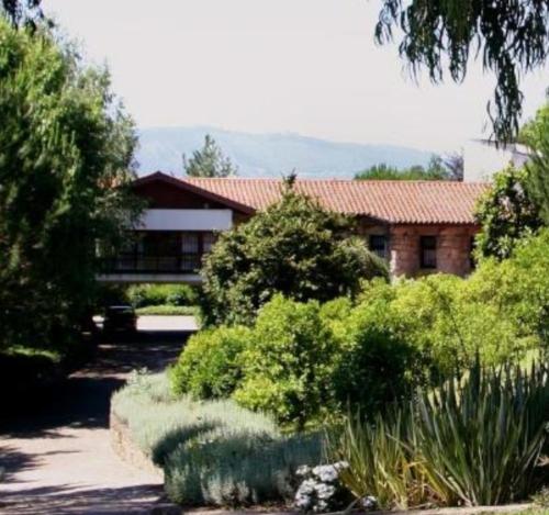 a house with a garden in front of it at Casa do Monte in Vizela