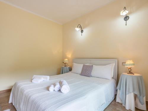 Postel nebo postele na pokoji v ubytování Maison Pinella
