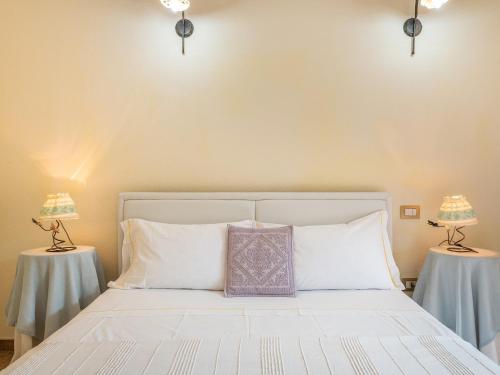 Postel nebo postele na pokoji v ubytování Maison Pinella