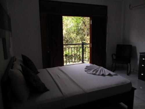 Cama o camas de una habitación en Sun Set Forest Villa