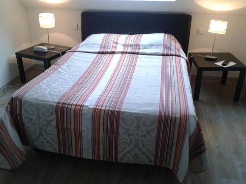 Postel nebo postele na pokoji v ubytování Hôtel Des Bois