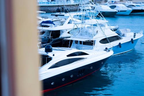a group of boats are docked in the water at El Gouna Elite Worldwide Sea & Garden Residences - Hurghada, Egypt in Hurghada
