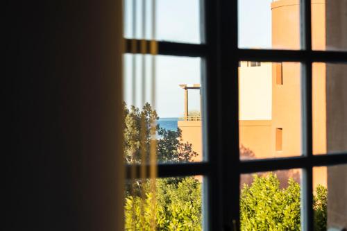 a view from a window looking out at the city at El Gouna Elite Worldwide Sea & Garden Residences - Hurghada, Egypt in Hurghada