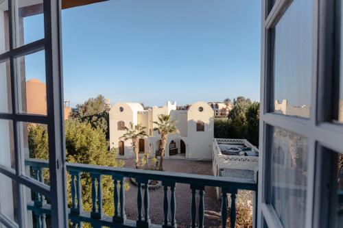 a view from the balcony of a house at El Gouna Elite Worldwide Sea & Garden Residences - Hurghada, Egypt in Hurghada